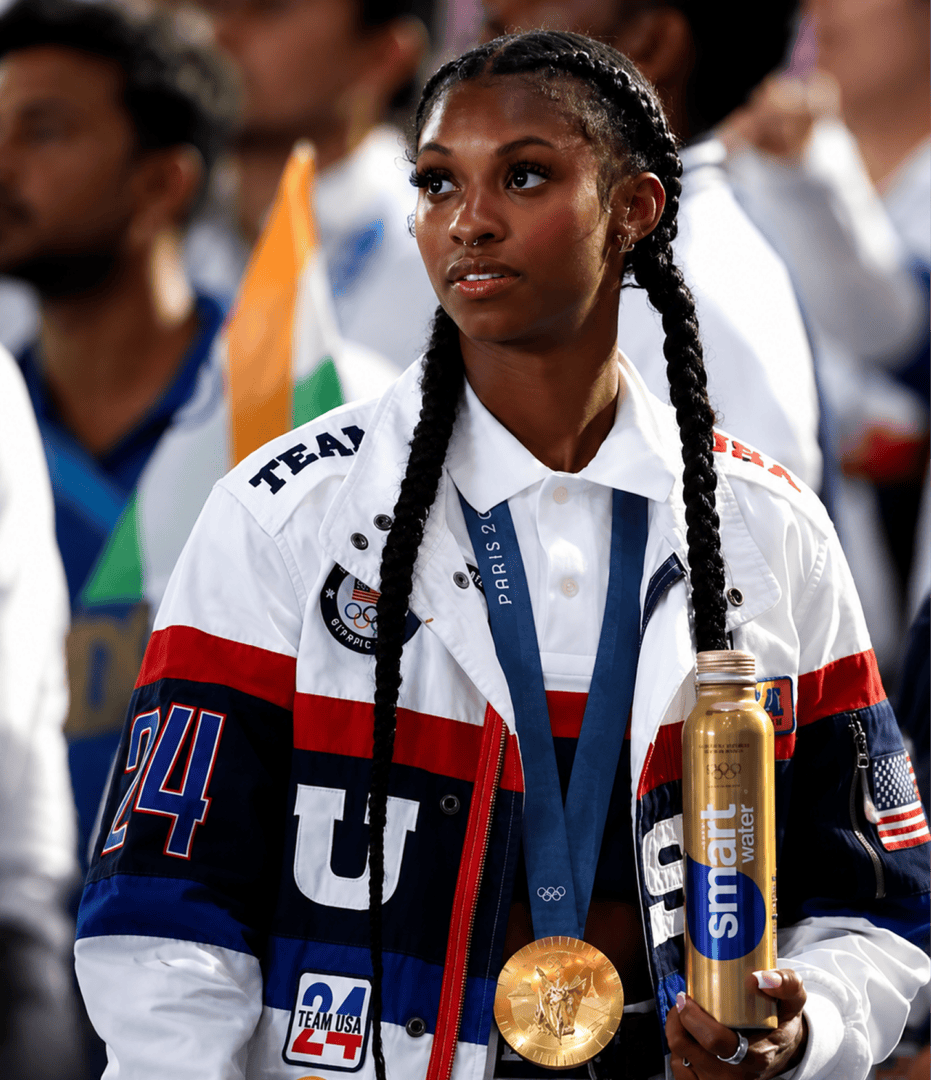 Athlete with braided hair and medal